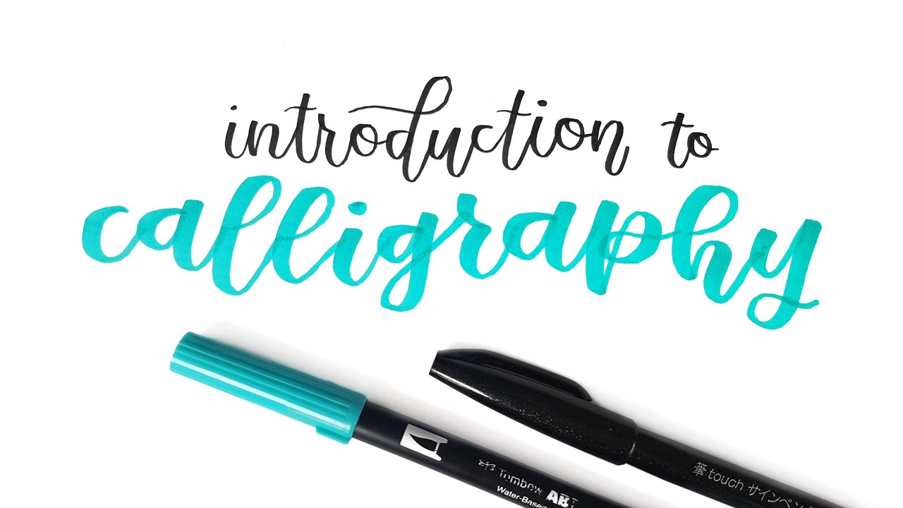 calligraphy writing and pens