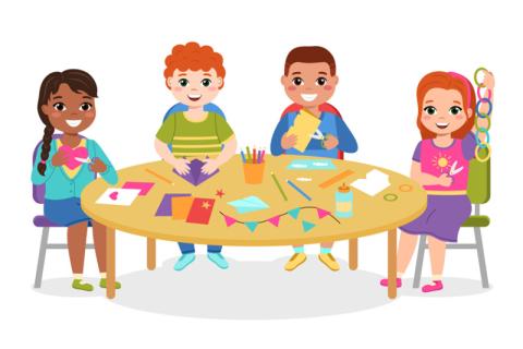 tweens crafting around a table